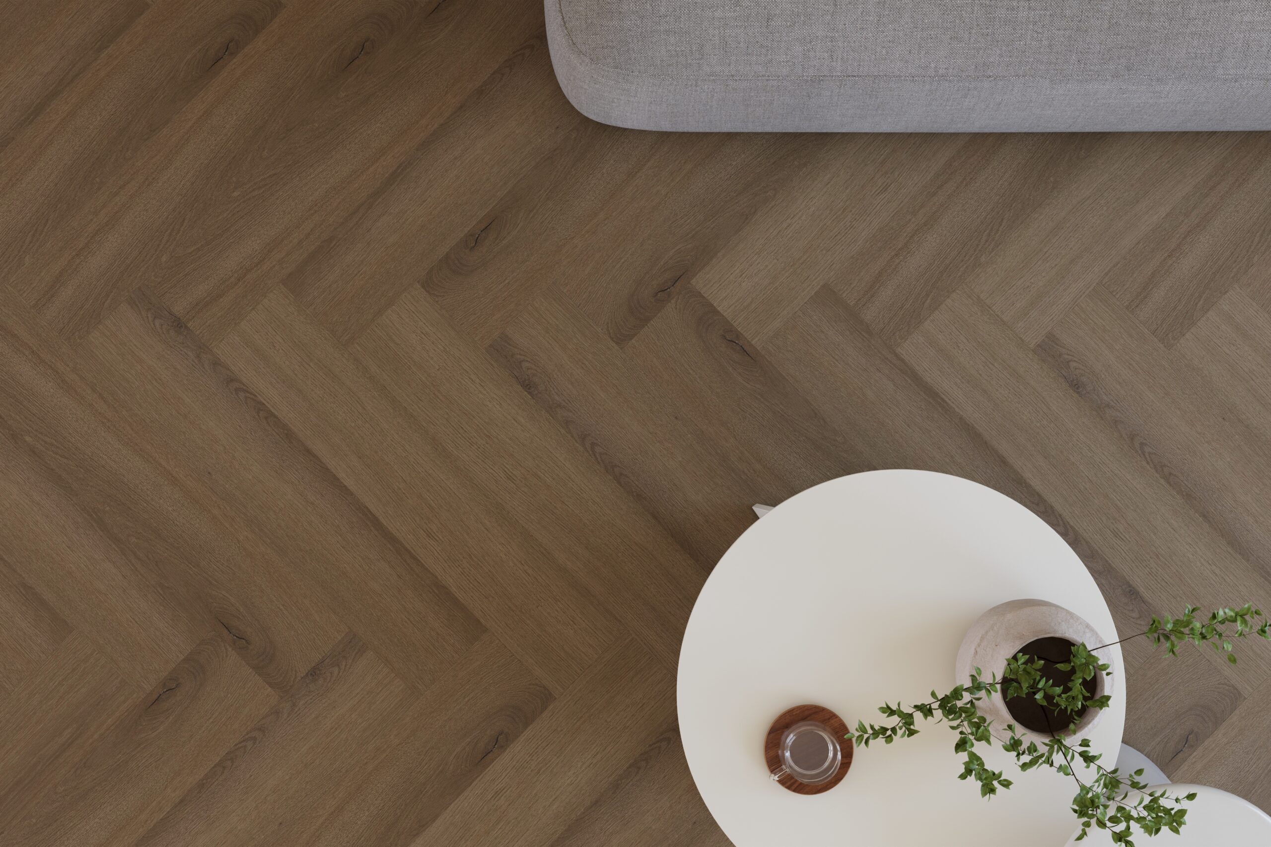 Castell Ultimate 880 Cedar Ash 284 plak PVC visgraat gelegd in een rustige woonruimte