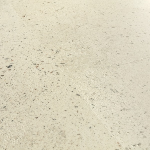 QuickStep Illume Kiezelbeton AVMTU40276 click PVC tegel detail van voegen en rustige kleurschakeringen