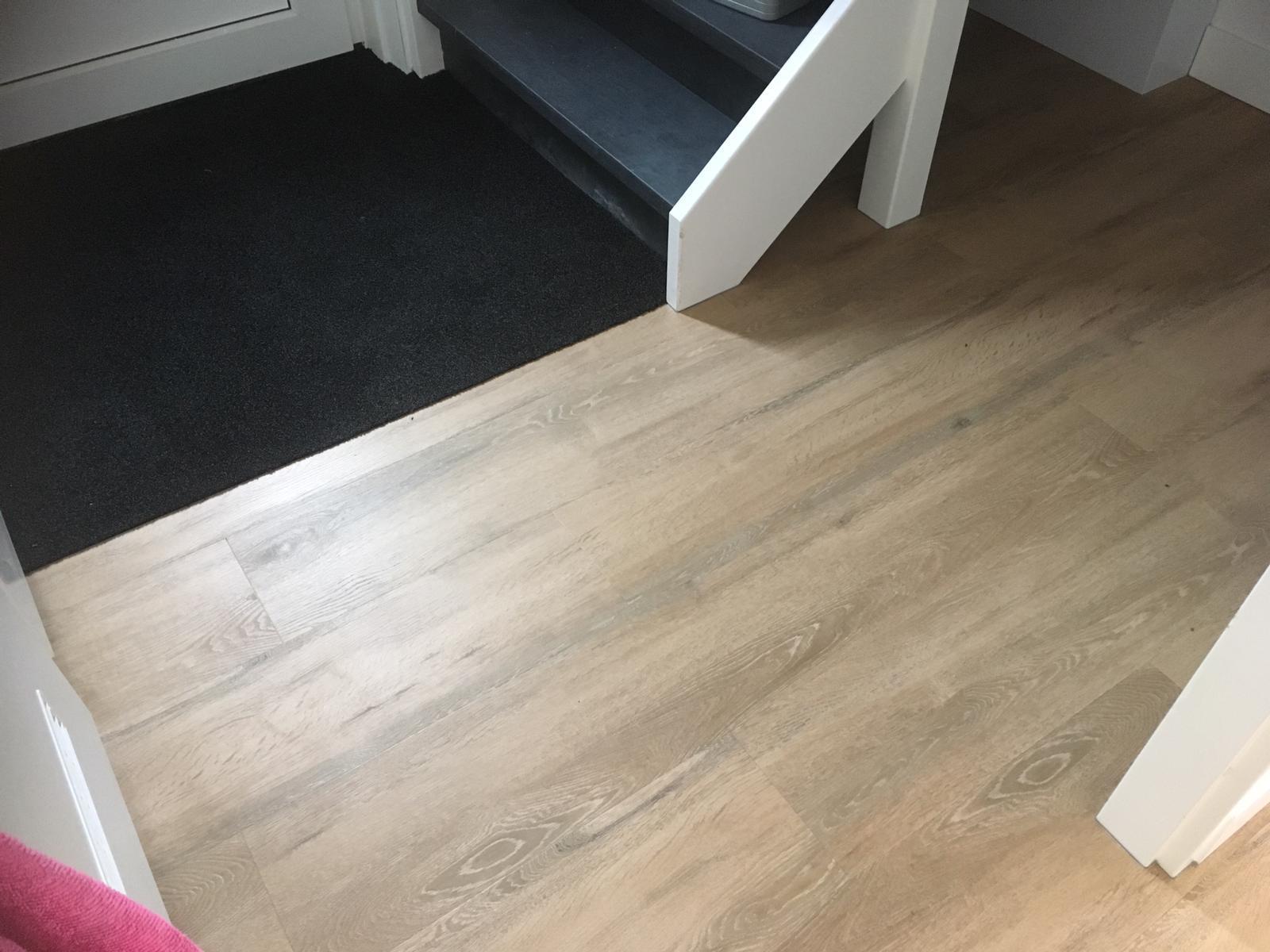 deurmat strak tegen pvc aan