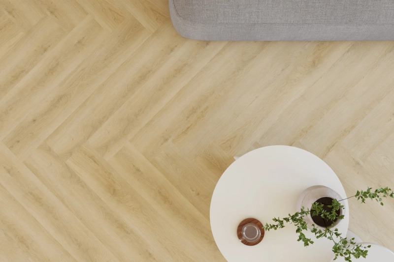 Castell Supreme 860 Herringbone XL 218 Sienna visgraat plak pvc in woonkamer sfeerfoto