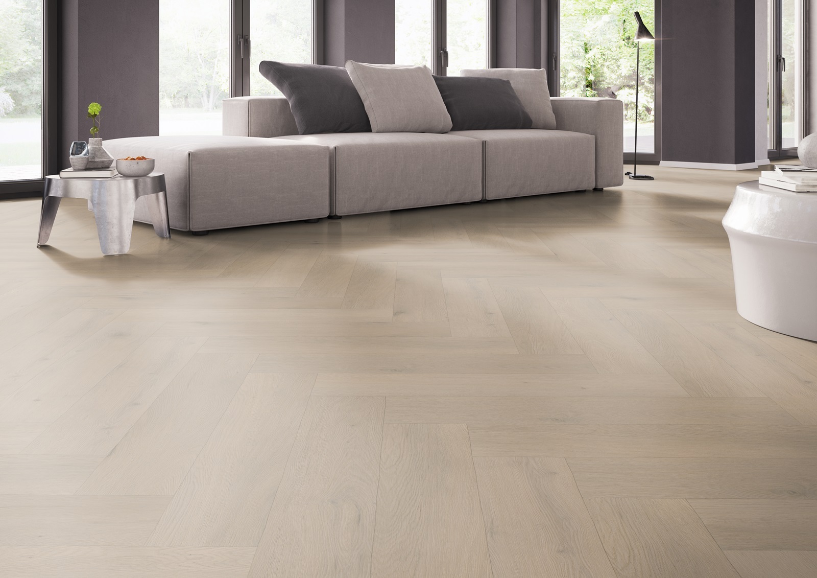 Sfeerbeeld in woonkamer met Belakos Attico Visgraat XL 83 click PVC vloer