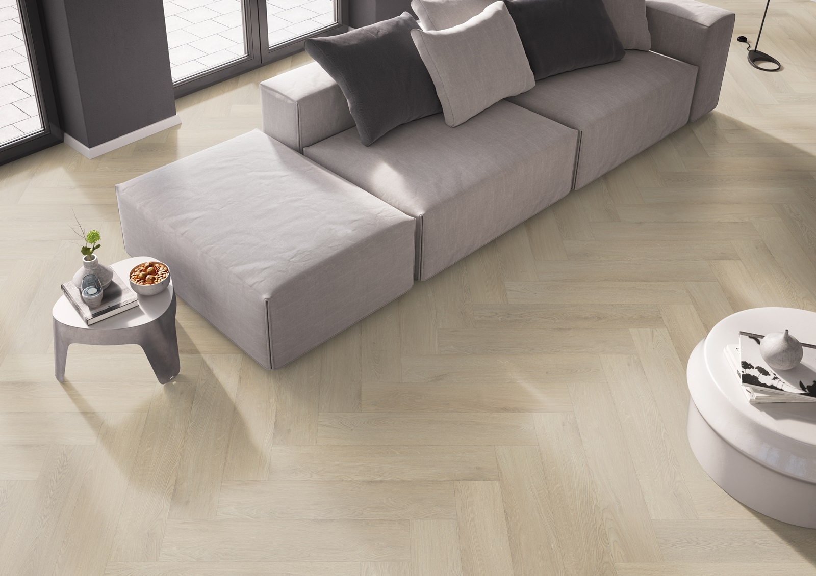 Sfeerbeeld in woonkamer met Belakos Palazzo Visgraat XL 73 plak PVC vloer